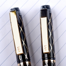 金万年 G-1283 黑金0.7子弹头配RS14系列芯金色夹拔帽中性笔-12支/盒